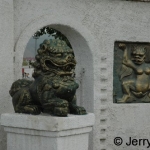 Lion/woman chimera & lion statue