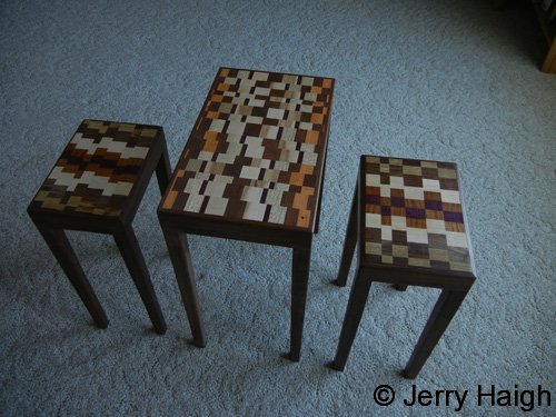 Three small laminated tables