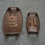 Two small trays with curved edges